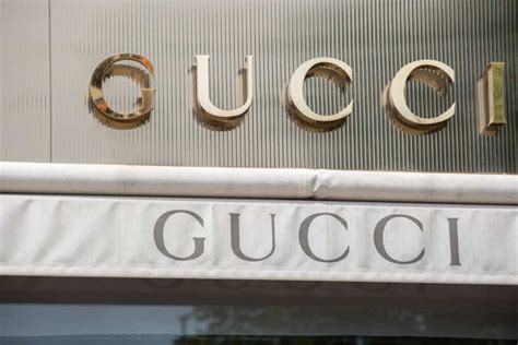 who is running gucci|gucci is owned by.